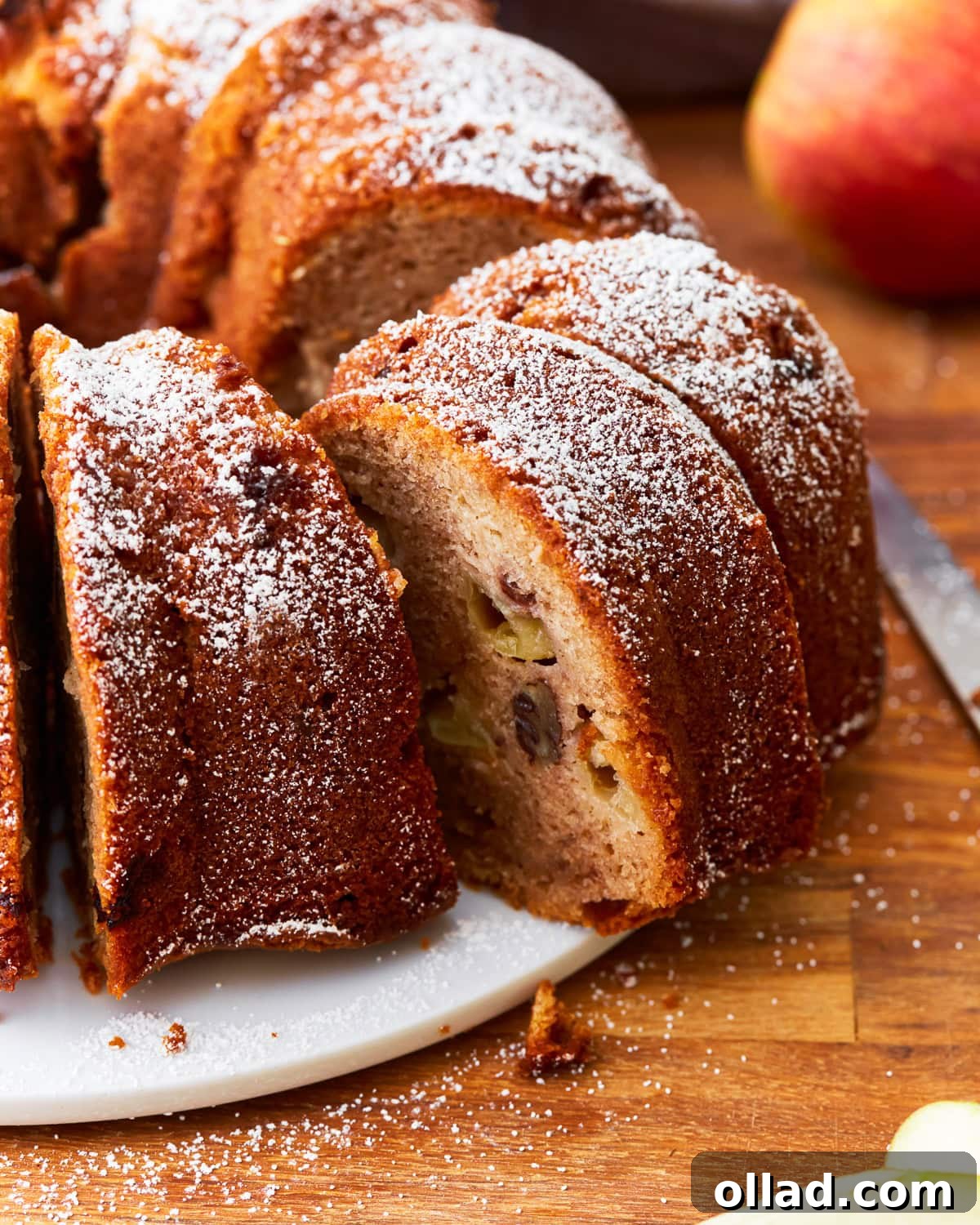Feast-Worthy Gluten-Free Thanksgiving Desserts 4 A close up of a sliced gluten-free apple cake.