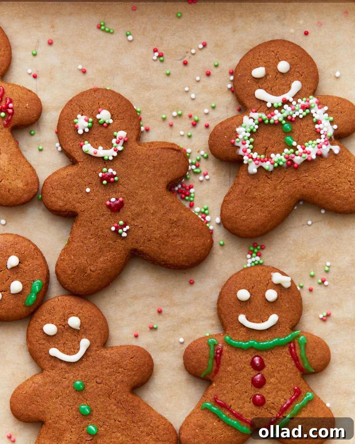 Gluten Free Gingerbread Delights 2 Overhead view of decorated gluten-free gingerbread cookies, showcasing various festive shapes and intricate icing designs.