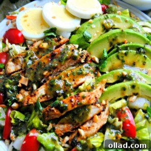 Grilled Chicken Chimichurri Salad with vibrant green sauce