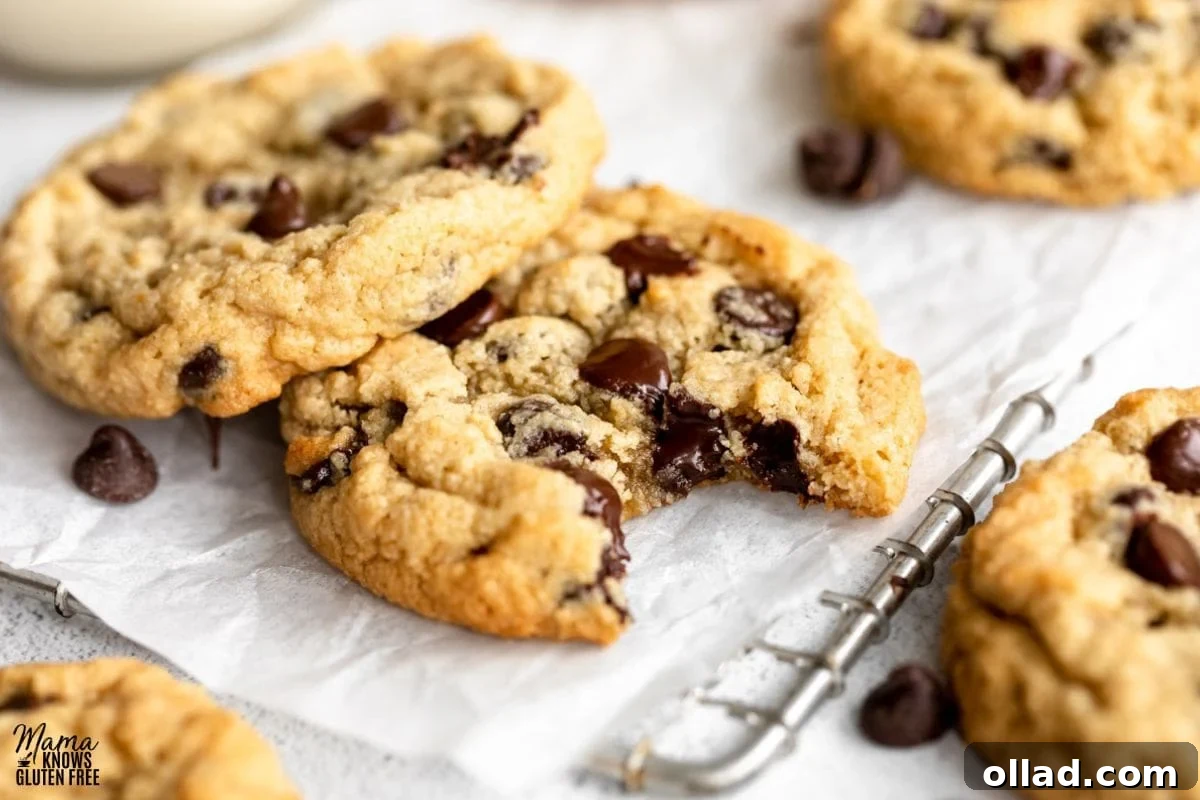 Almond Flour Chocolate Chip Cookies cooling on a wire rack after being removed from the baking sheet.