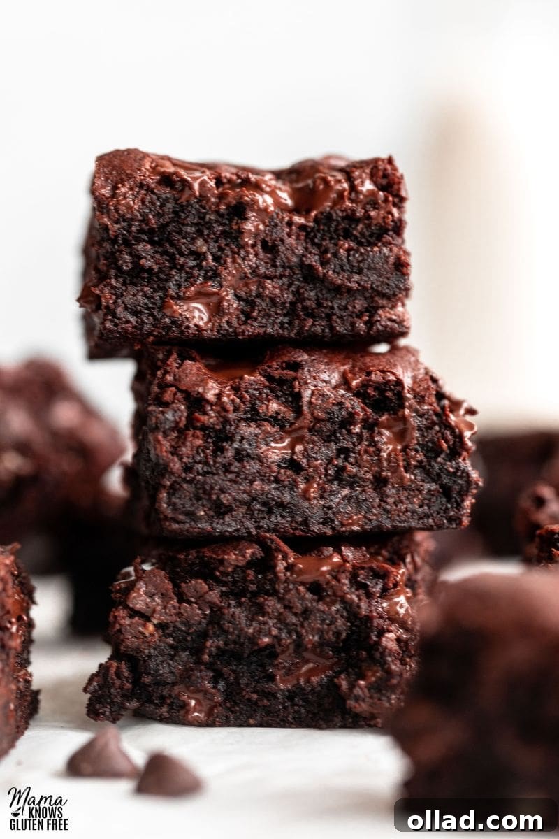 Decadent Almond Flour Fudge Brownies 11 Almond Flour Brownies squares in a pile.