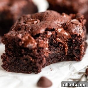 Decadent Almond Flour Fudge Brownies 4 A cut up square of Almond Flour Brownies.