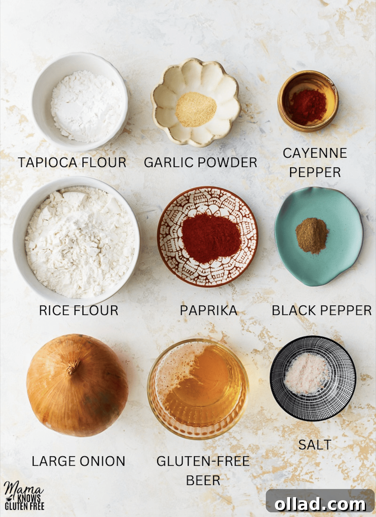 Crispy Gluten-Free Onion Rings 3 A vibrant flat lay of all the essential ingredients laid out for making gluten-free onion rings, including flours, spices, and a bottle of gluten-free beer.