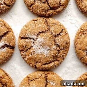 gluten-free molasses cookies on white parchment paper