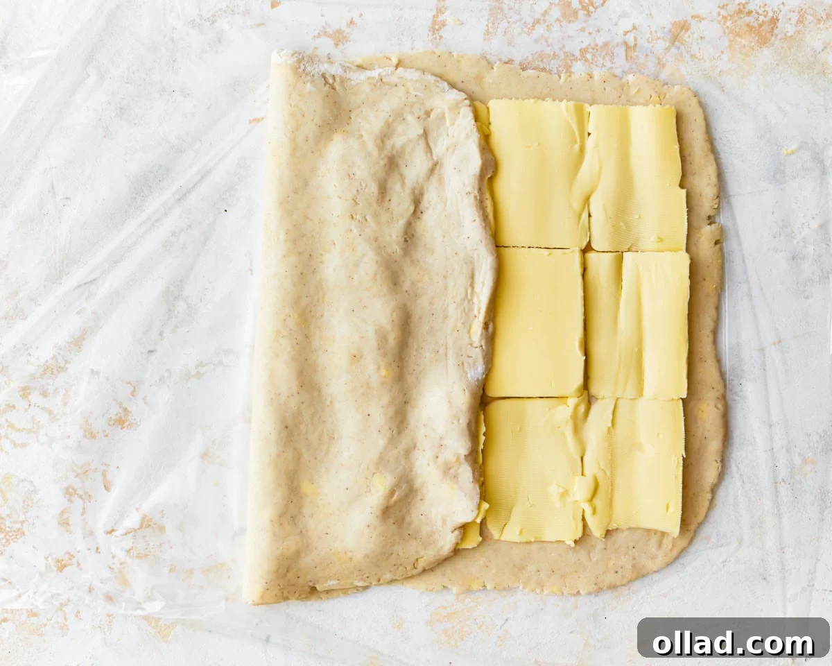 Unbelievably Flaky Gluten-Free Puff Pastry 12 The unbuttered third of the gluten-free puff pastry dough folded over the middle buttered section.