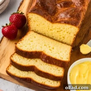 Overhead view of a sliced gluten-free brioche loaf.