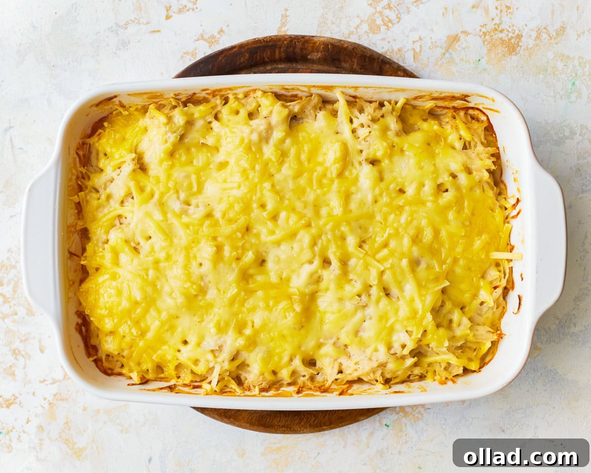 dairy-free cheesy potatoes in a baking dish.