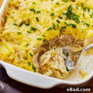 Overhead view of dairy-free cheesy potatoes from a baking dish.