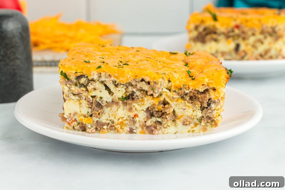 side view of piece of breakfast casserole on white plate