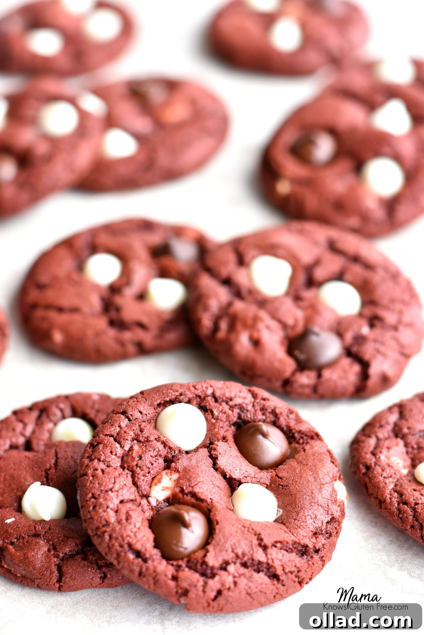 Gluten-Free Dairy-Free Red Velvet Chocolate Chip Cookies 4 Freshly baked gluten-free red velvet chocolate chip cookies on a cooling rack
