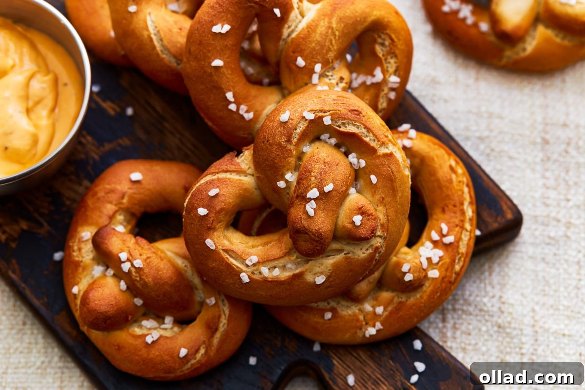 Gluten-Free Game Day Victory Bites 7 gluten free soft pretzels on a cutting board.