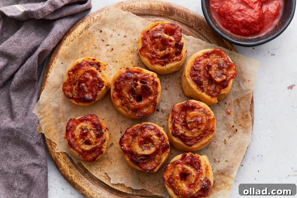 Irresistible Gluten-Free Pizza Poppers 13 finished pizza rolls on a serving tray