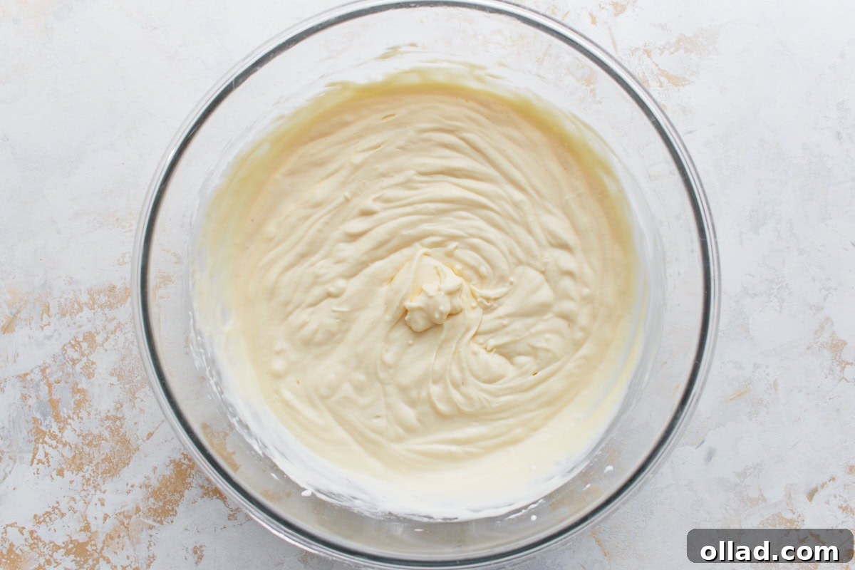 Silky, fully mixed keto cheesecake batter ready to be poured into the pan.