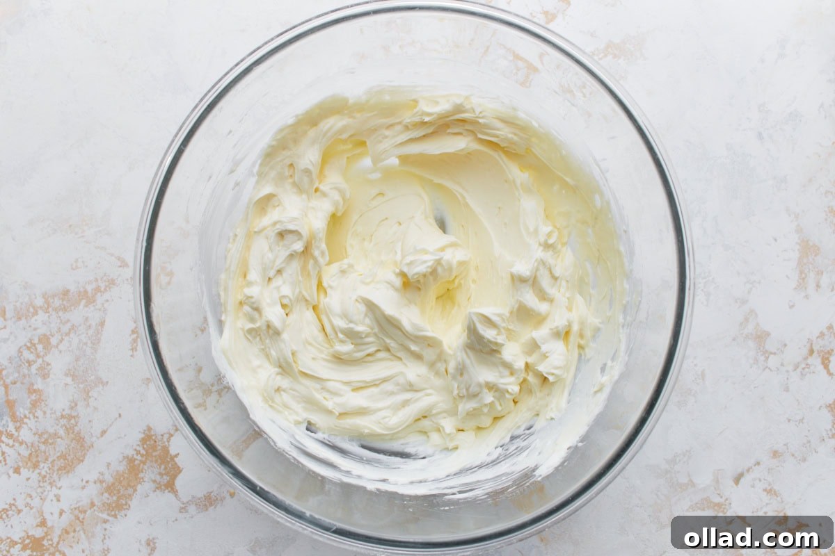Softened cream cheese and powdered sweetener beaten until smooth in a glass mixing bowl.