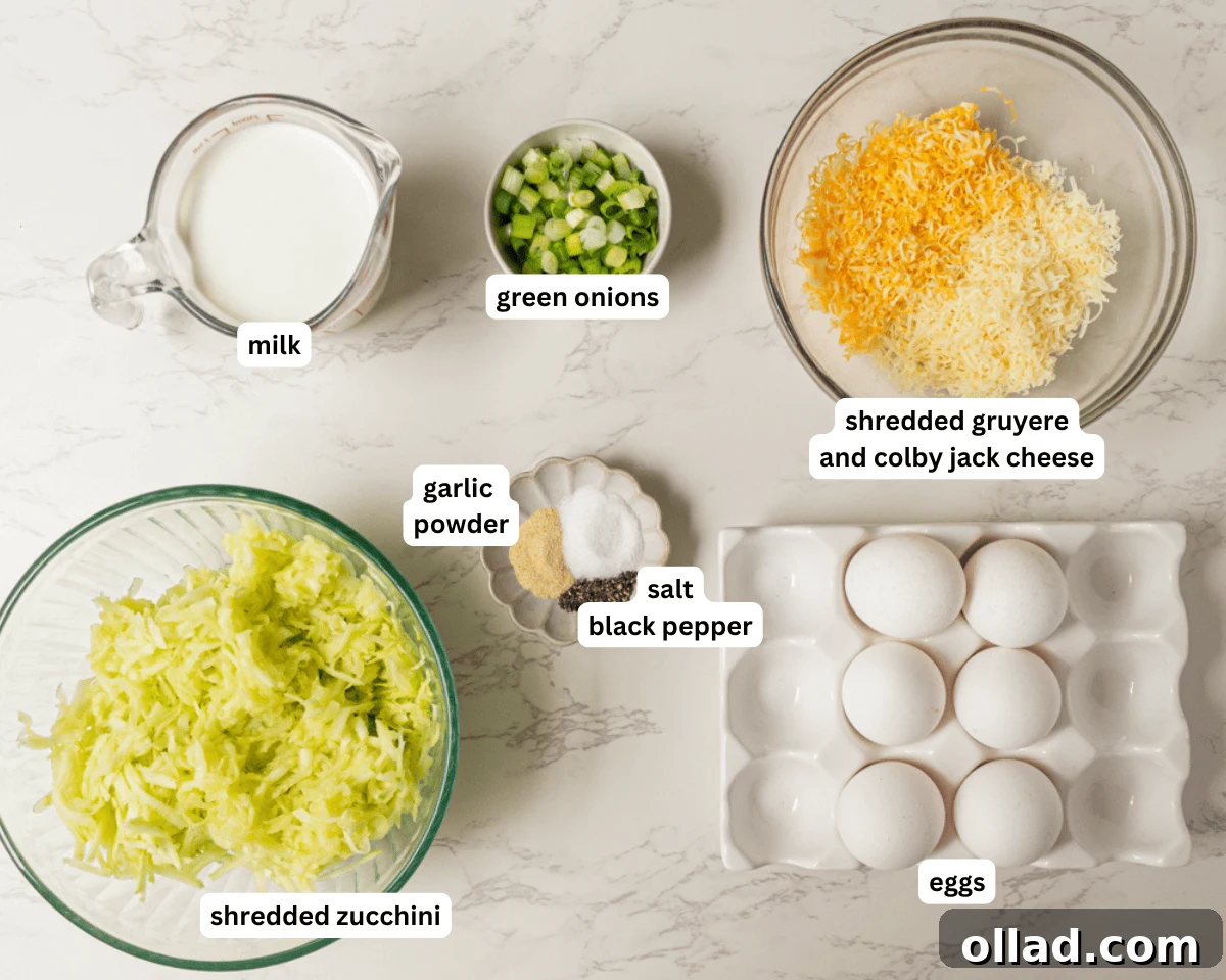 A vibrant collection of fresh ingredients for crustless zucchini quiche, including whole zucchini, eggs, half and half, a block of cheese, green onions, and various spices, neatly arranged on a rustic wooden table.