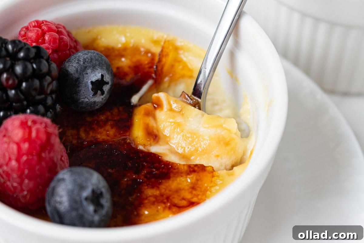 finished creme brulee with a spoon in it
