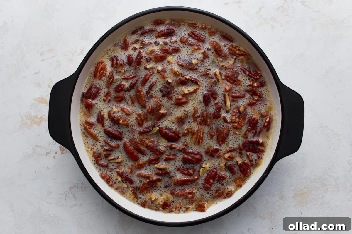 crustless pecan pie dish filled with pecans