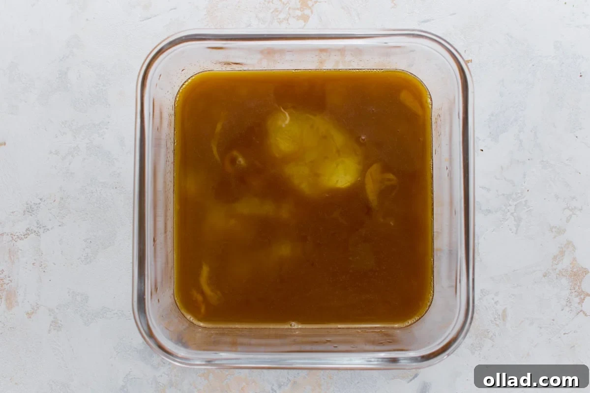Egg mixture whisked together in a glass bowl before cooking