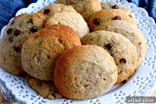 Stack of fluffy gluten-free banana bread cookies with optional chocolate chips.