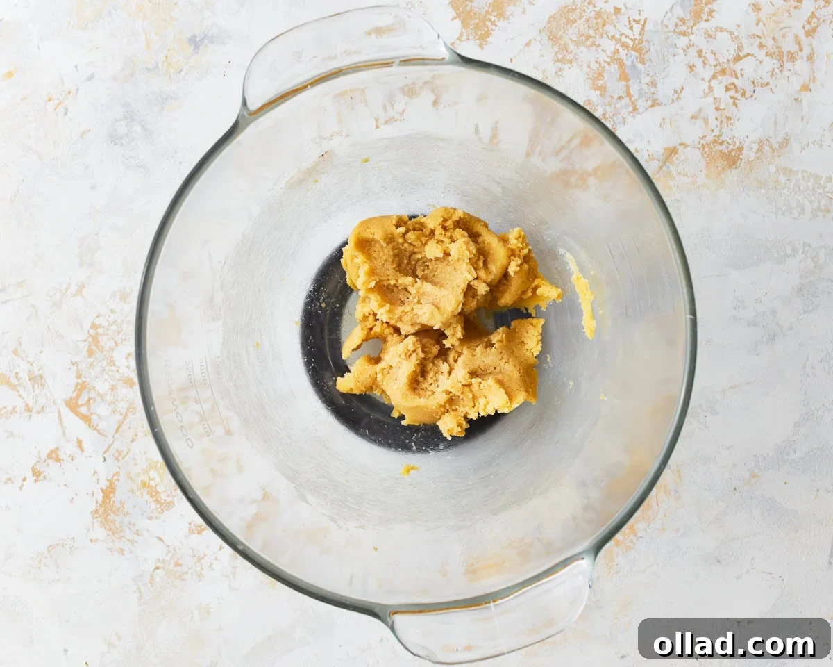 Wholesome Gluten-Free Oatmeal Cookies 7 beaten butter and sugars in a glass bowl.