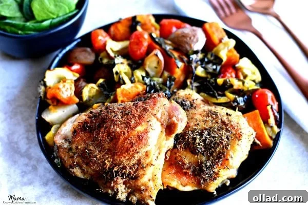 Close-up of golden brown crispy chicken thighs in a glass baking dish