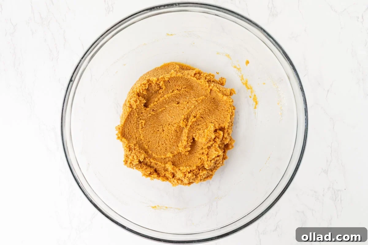 Gluten-free almond flour pumpkin cookie dough after the dry and wet ingredients are combined.